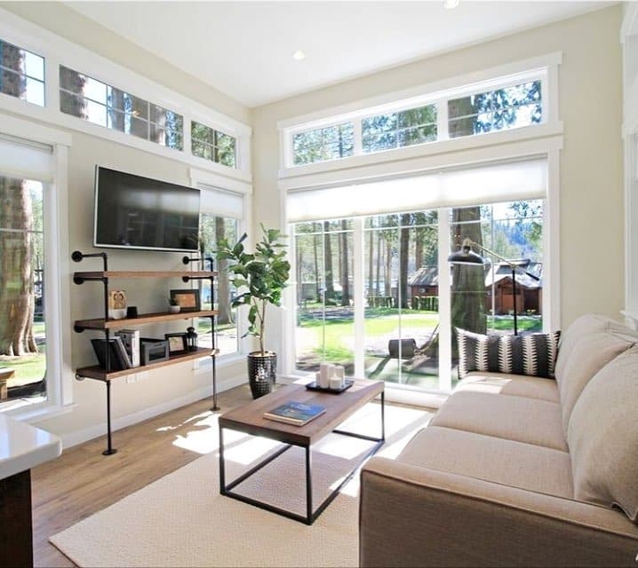 8. Glass-Filled Modern Retreat - tiny house living room ideas