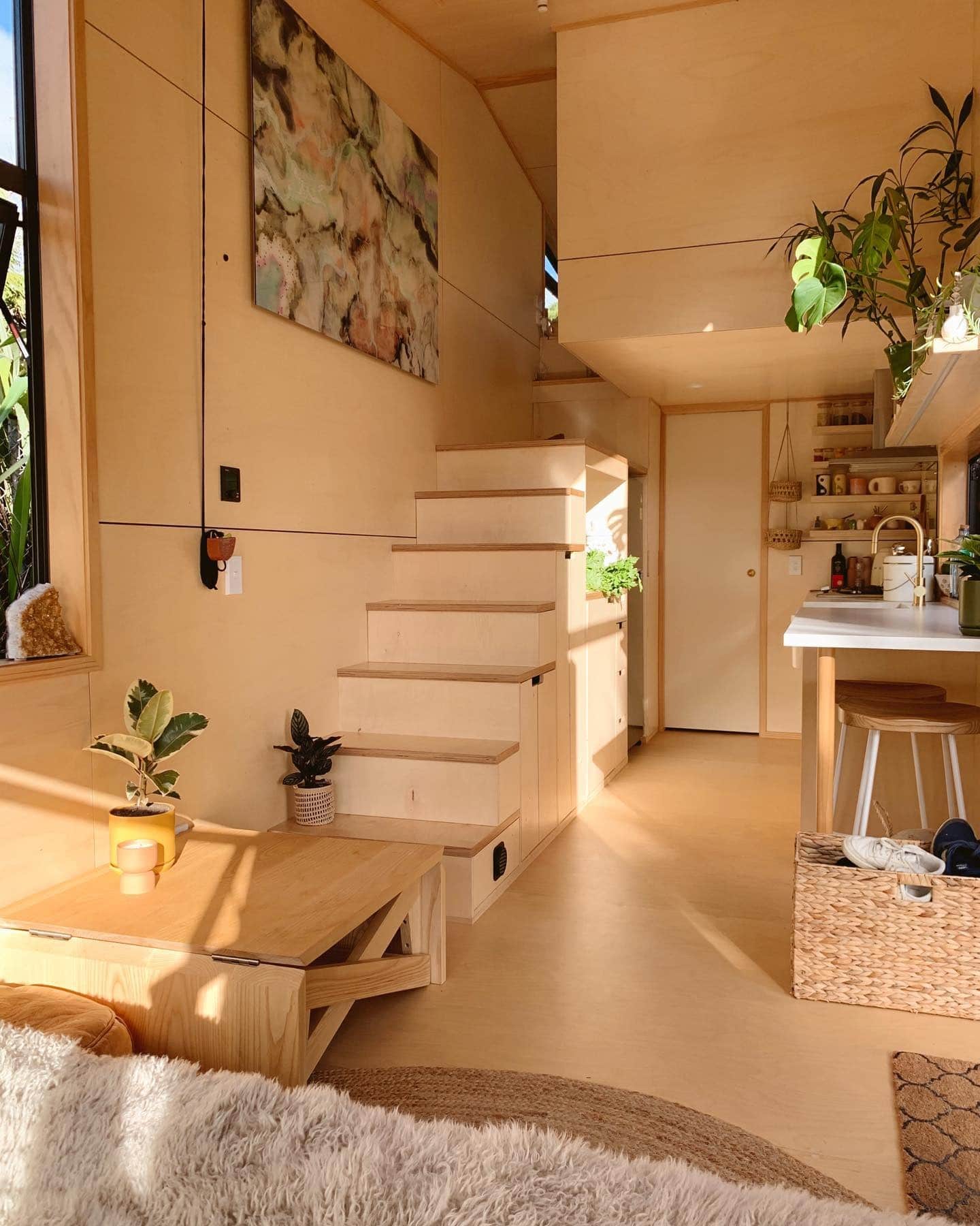 9. Minimalist Warmth with Natural Textures - tiny house living room ideas