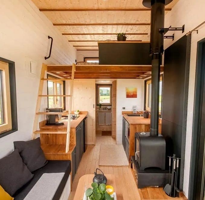 10. Scandinavian Charm with Rustic Warmth - tiny house living room ideas