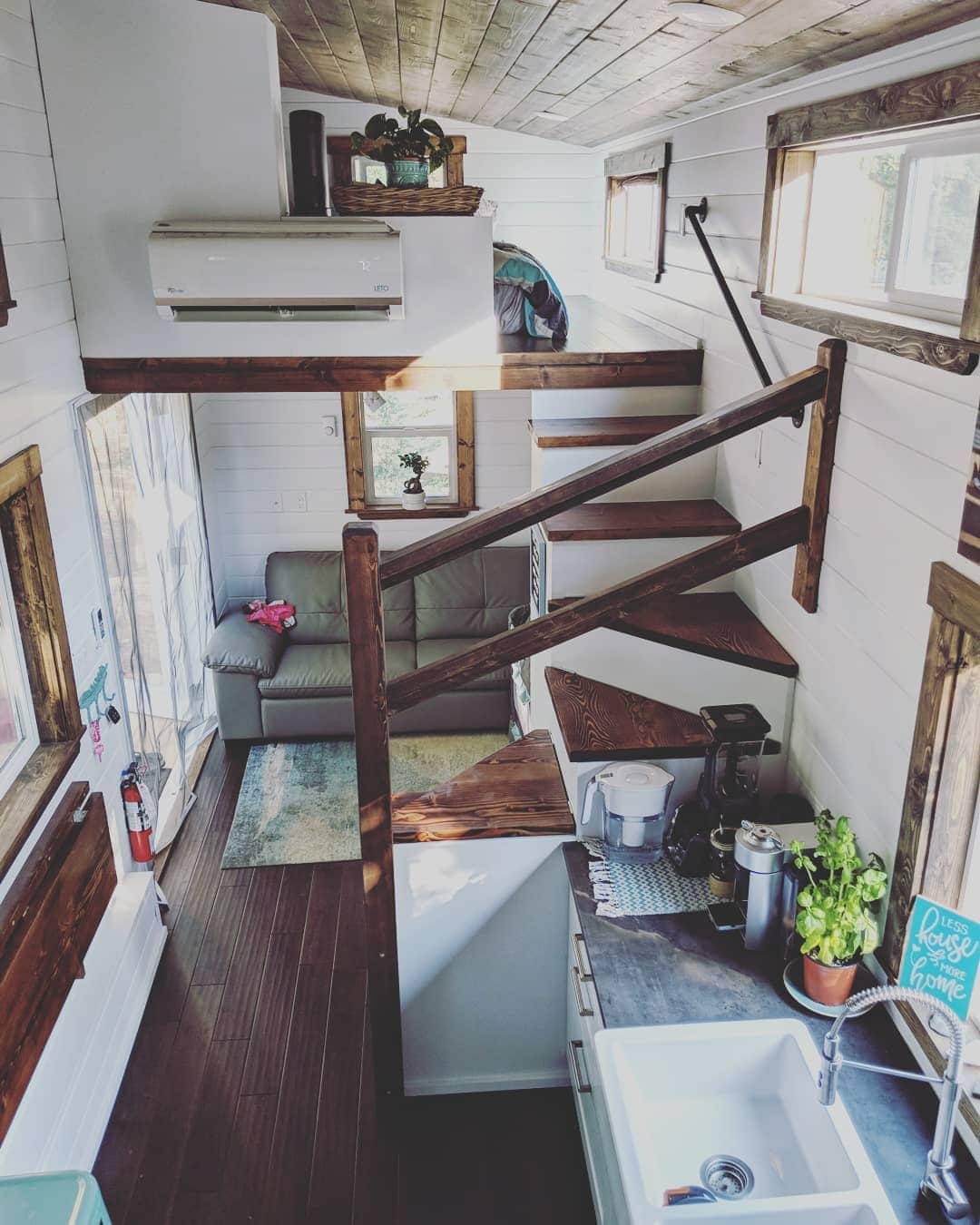 17. Classic White Interior with Rustic Trim - tiny house living room ideas