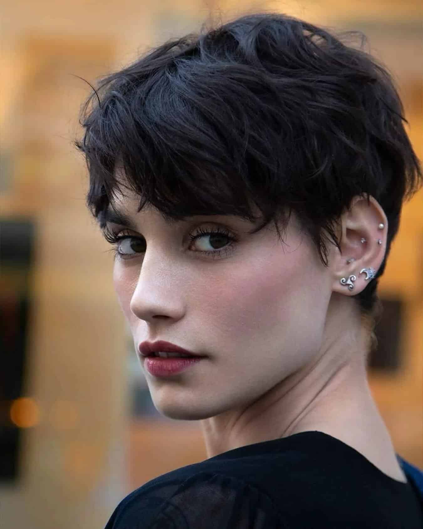 12. Dark Textured Pixie with Piecey Bangs - Pixie Haircuts With Bangs
