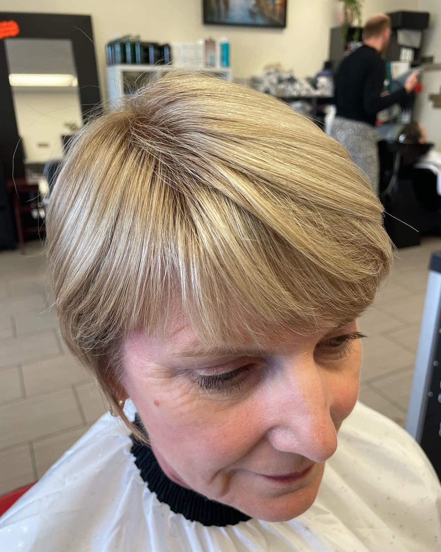 15. Classic Blonde Pixie with Straight Bangs - Pixie Haircuts With Bangs