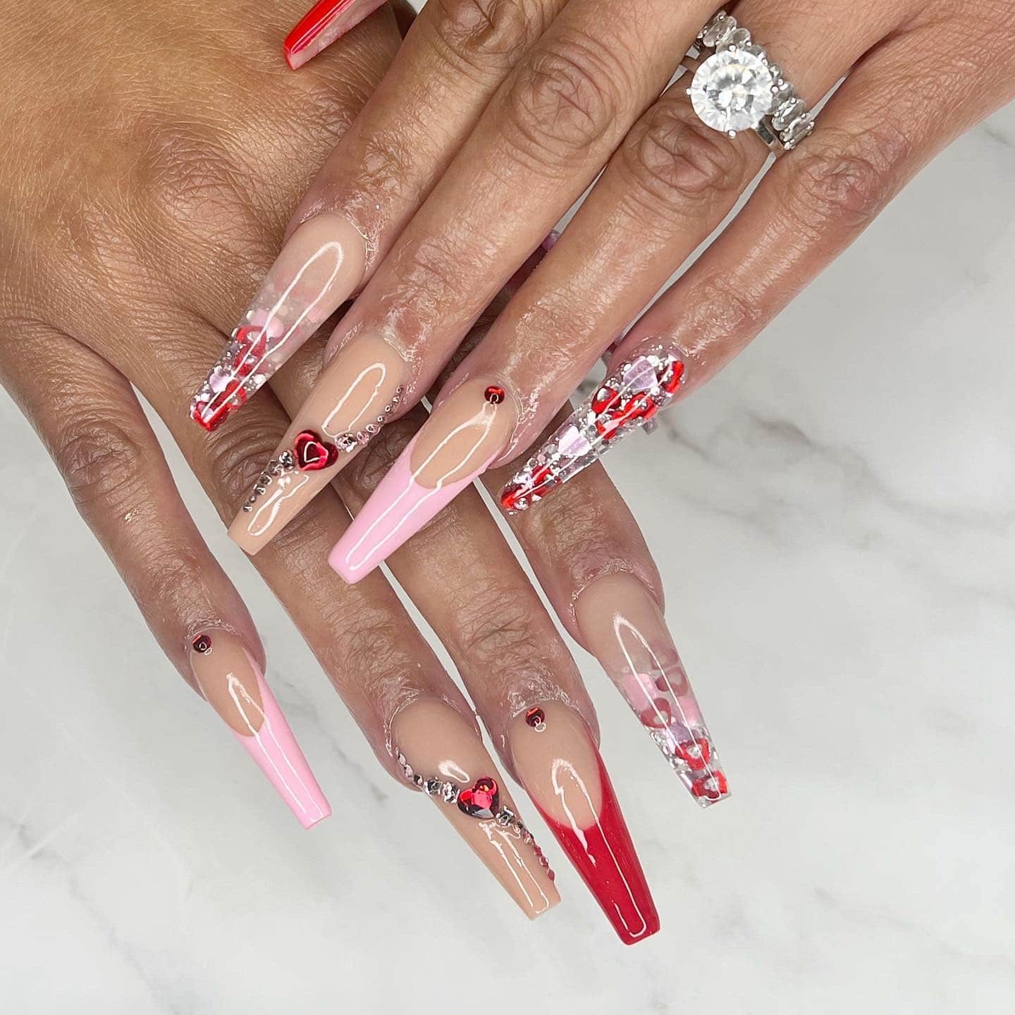 2. Crystal Heart Red Coffin Nails - beautiful coffin nail ideas