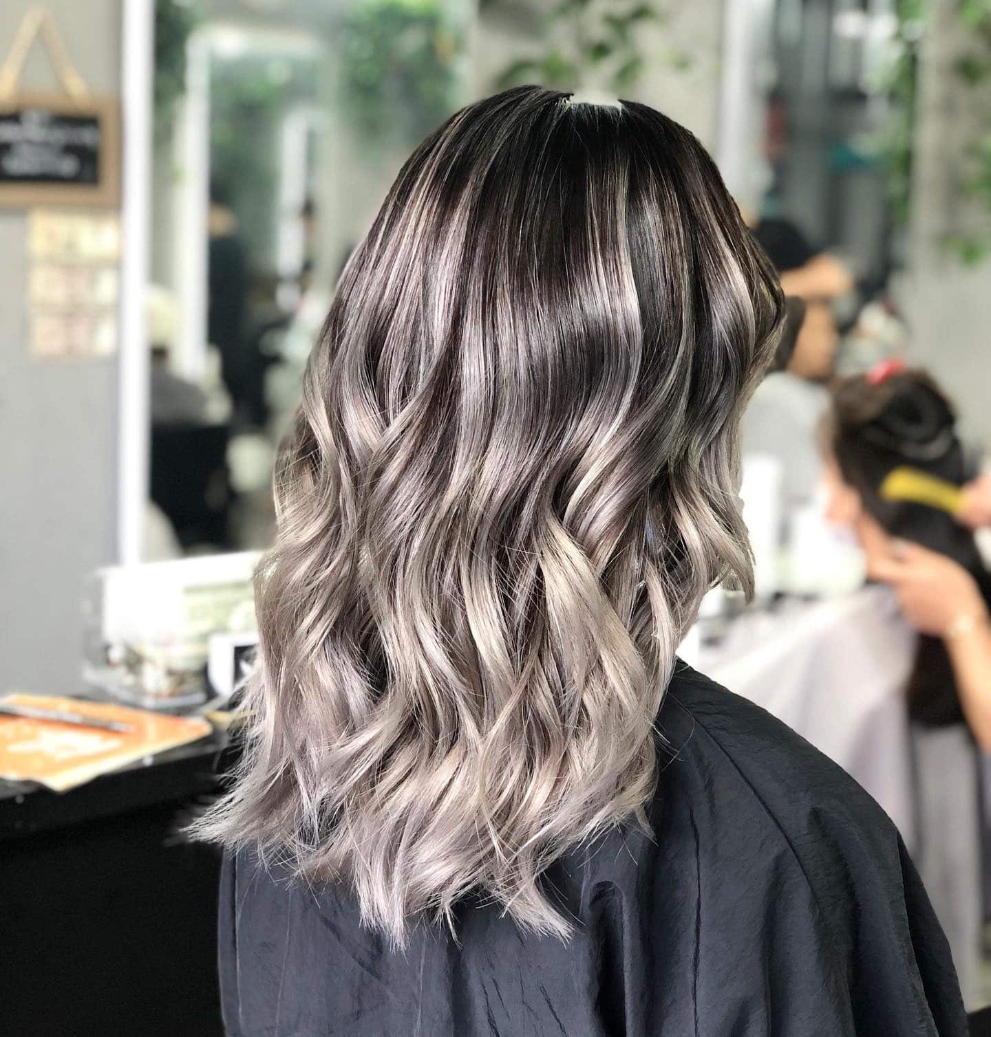 2. Smoky Ash Ombre with Loose Waves - Ash Grey Hair Color