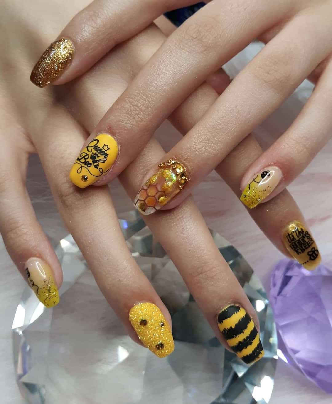 16. Golden Glitter Honeycomb Nails - bee nail ideas