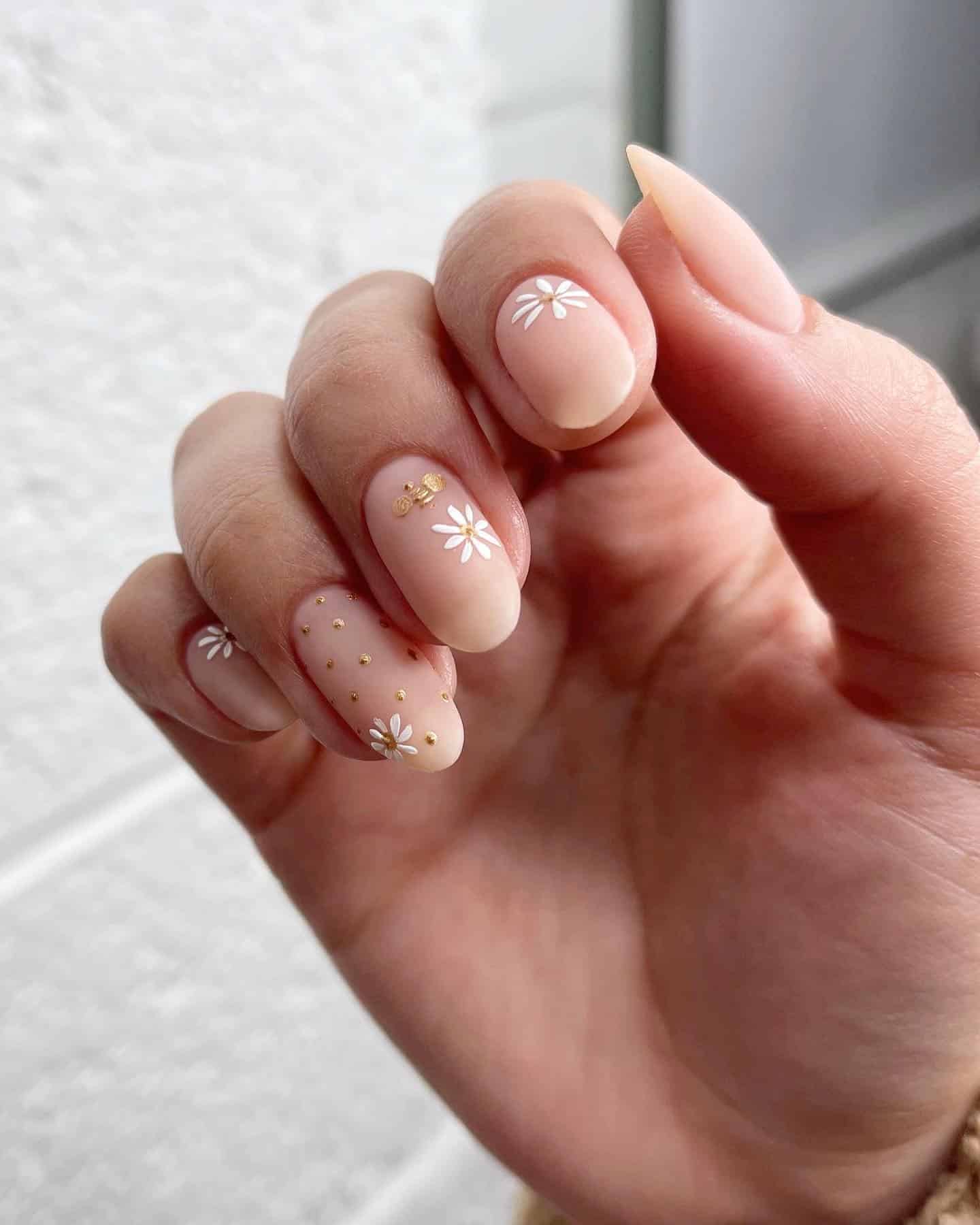 17. Minimal Nude Daisy Nails - bee nail ideas