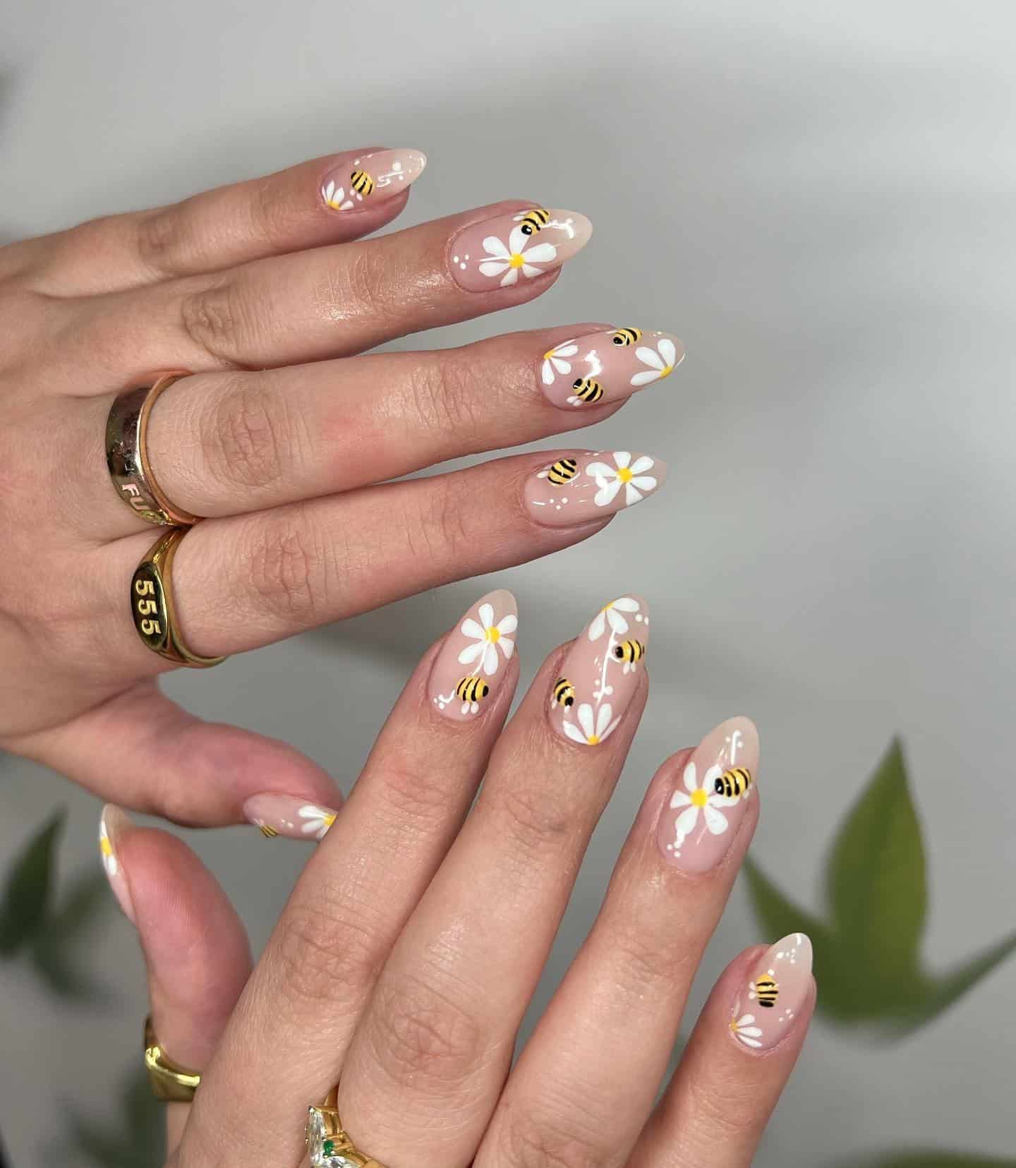 19. Bee and Daisy Stiletto Nails - bee nail ideas