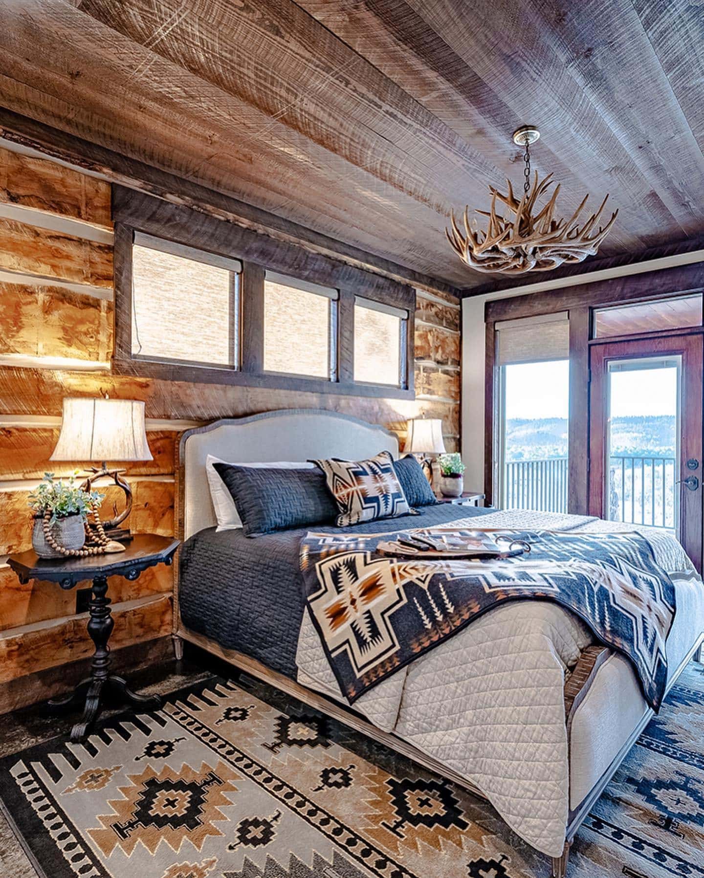 7. Southwestern Influence with Statement Rug - cabin bedroom ideas