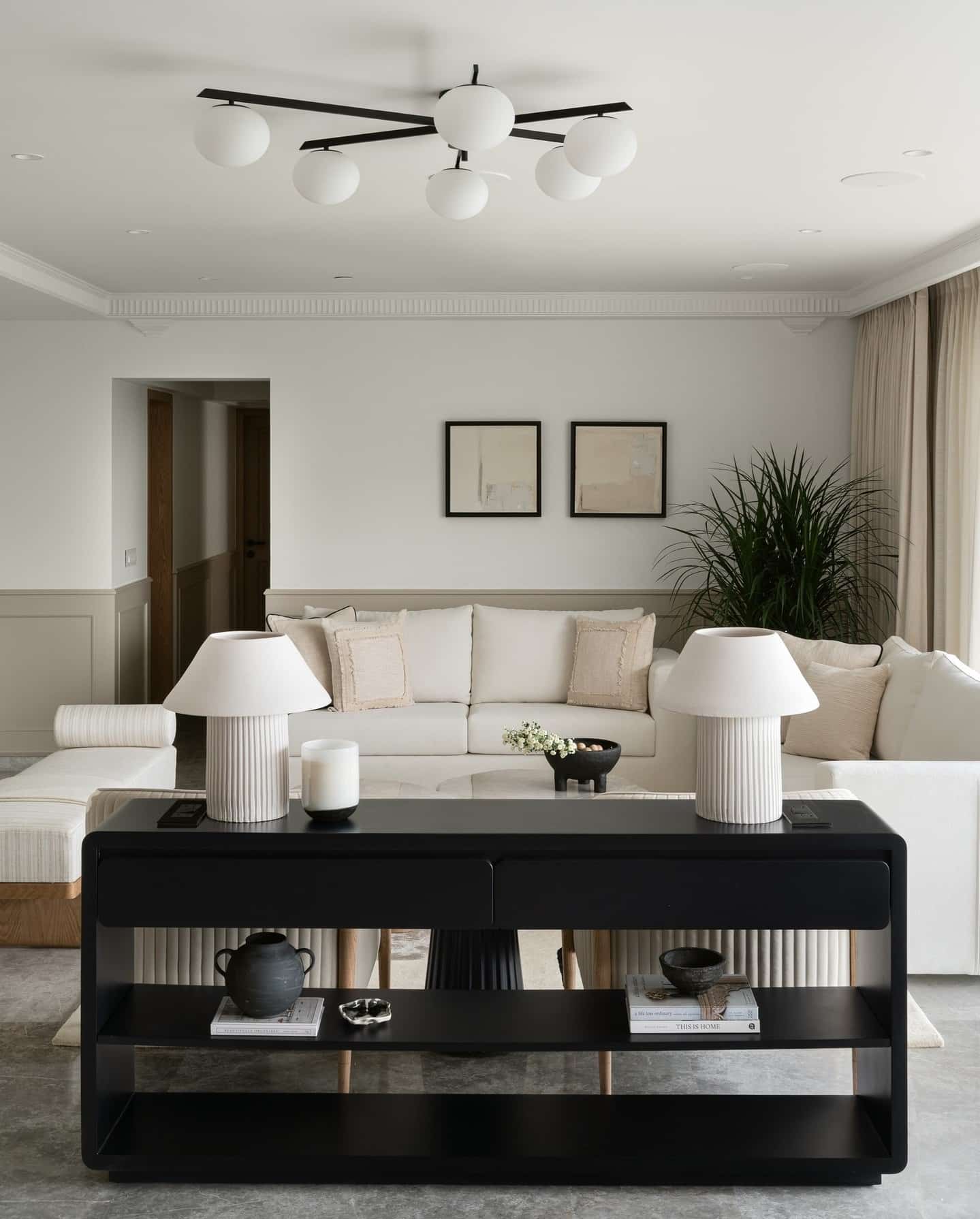 11. Monochrome Balance with Sleek Accents - black and gray living room ideas