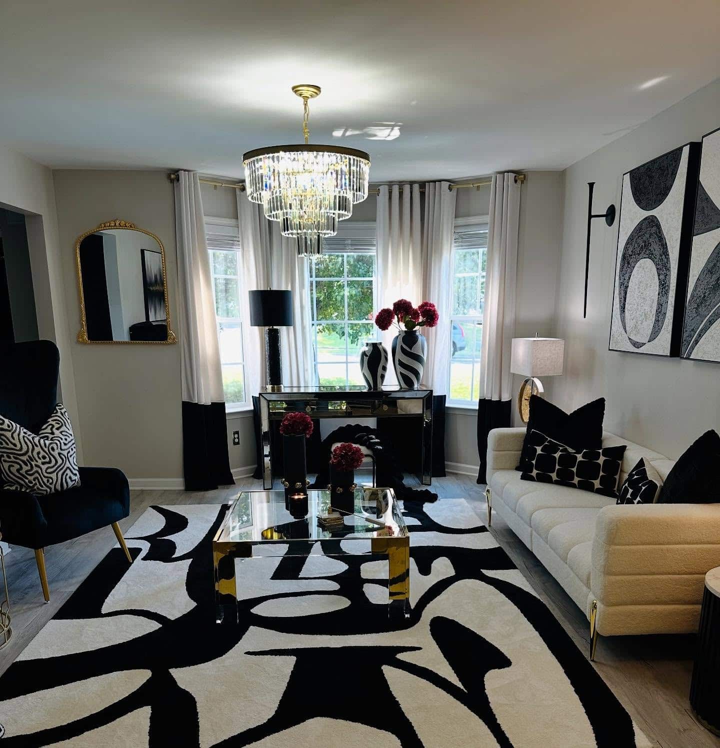 19. Black and White Glamour with Gold Details - black and gray living room ideas