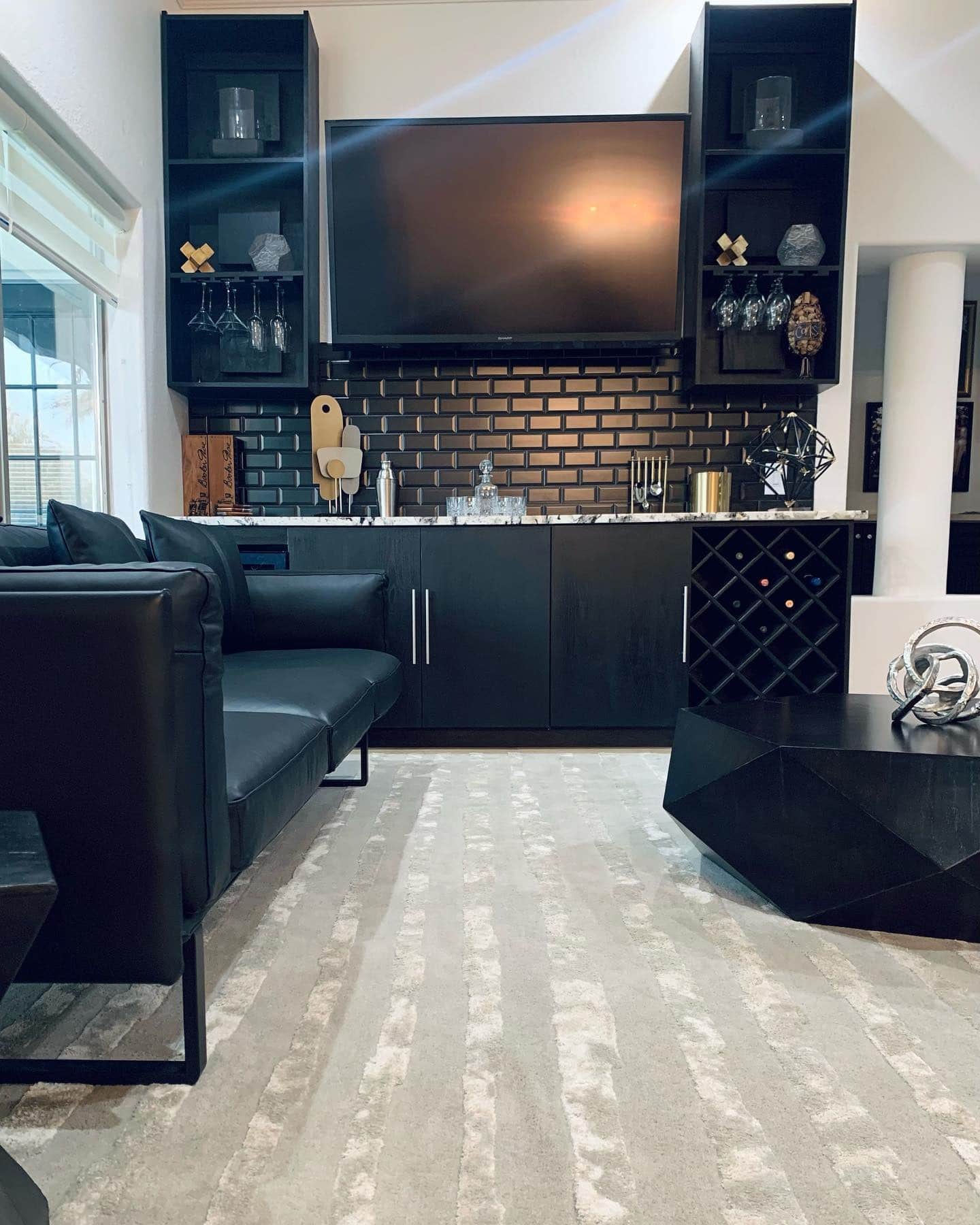 21. Modern Black Bar with Geometric Details - black and gray living room ideas