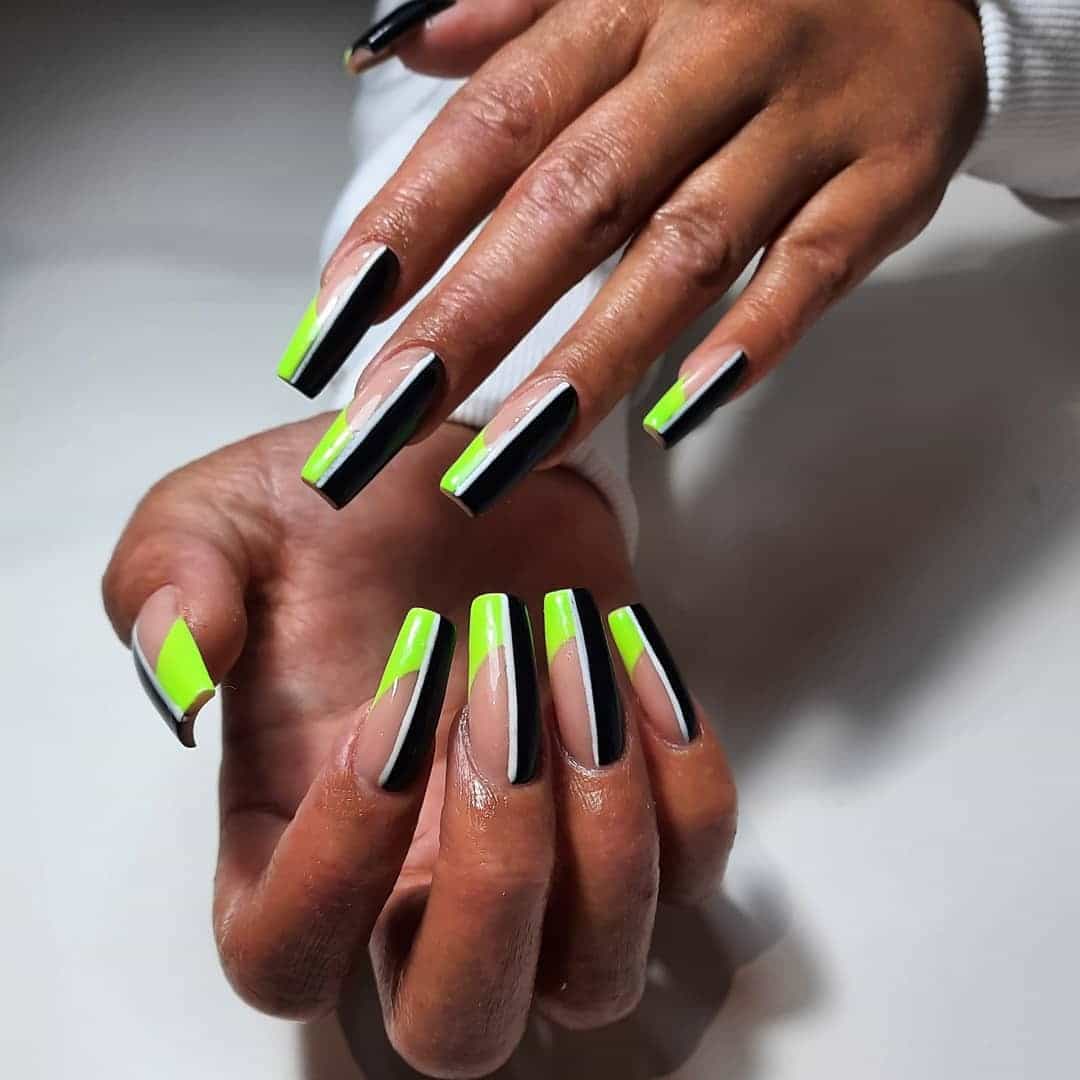 2. Neon Edge Coffin Design - black and green nail ideas