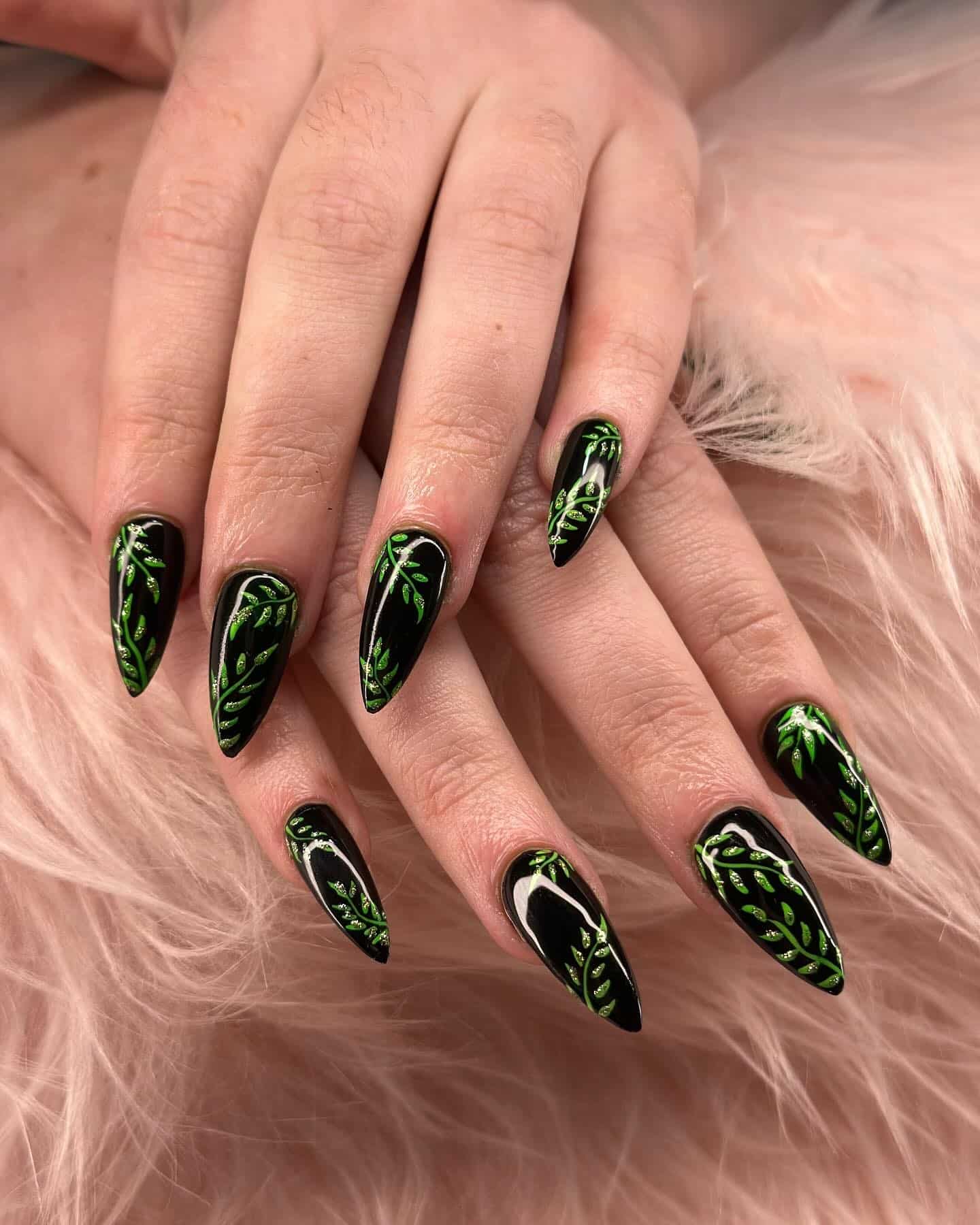 9. Ivy-Inspired Stiletto Art - black and green nail ideas