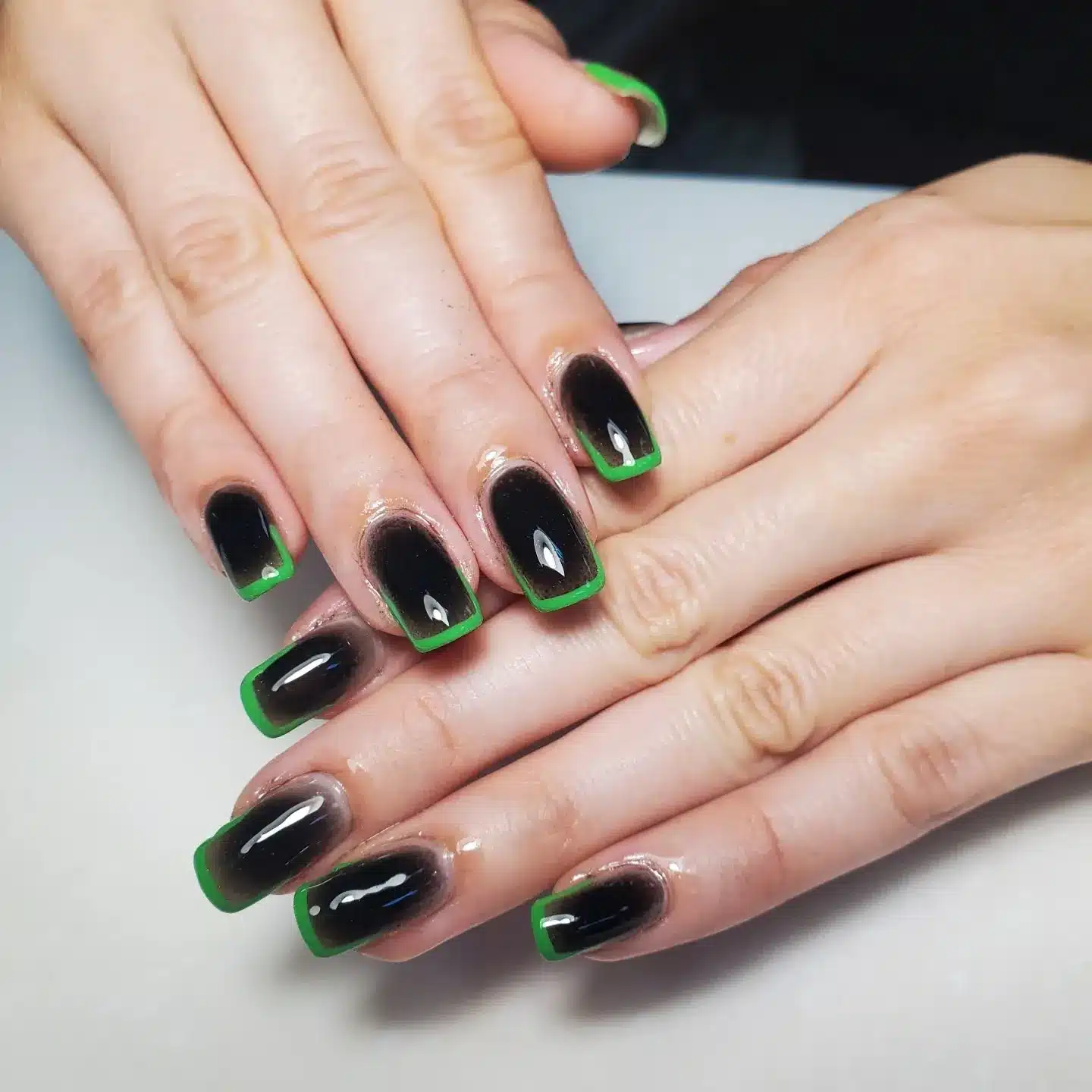 20. Black to Green Square French - black and green nail ideas