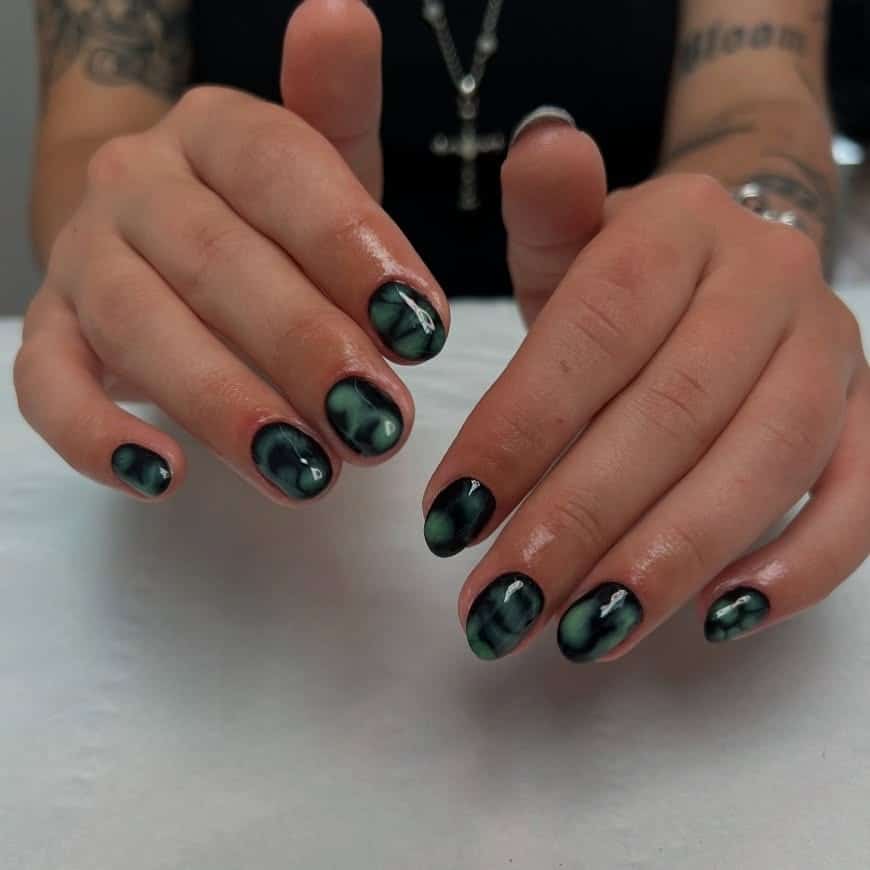 22. Smoky Green Marble Short Nails - black and green nail ideas