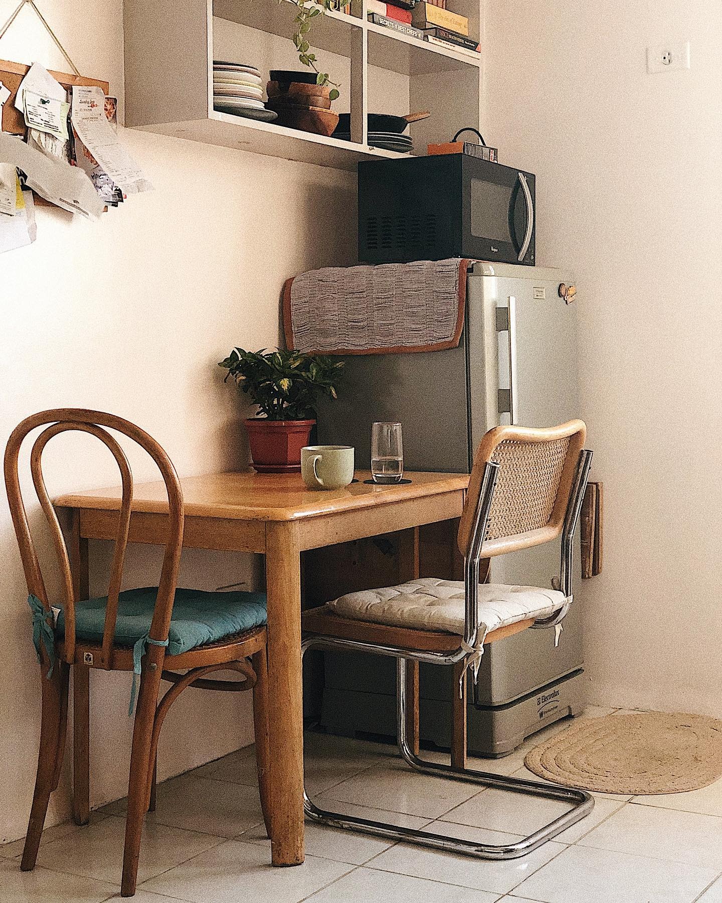3. Cozy Simplicity with Vintage Touches - small kitchen table ideas