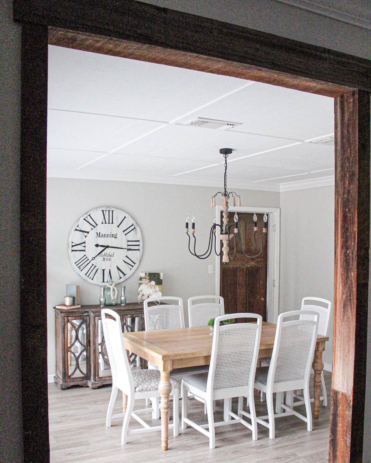 14. Classic Farmhouse Dining with Subtle Contrast - small kitchen table ideas