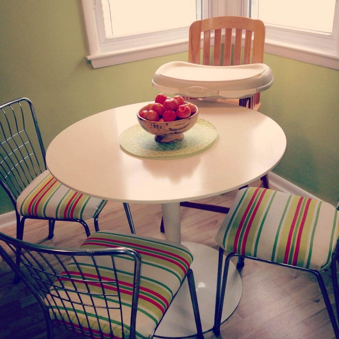 16. Playful Retro Charm with Pops of Color - small kitchen table ideas