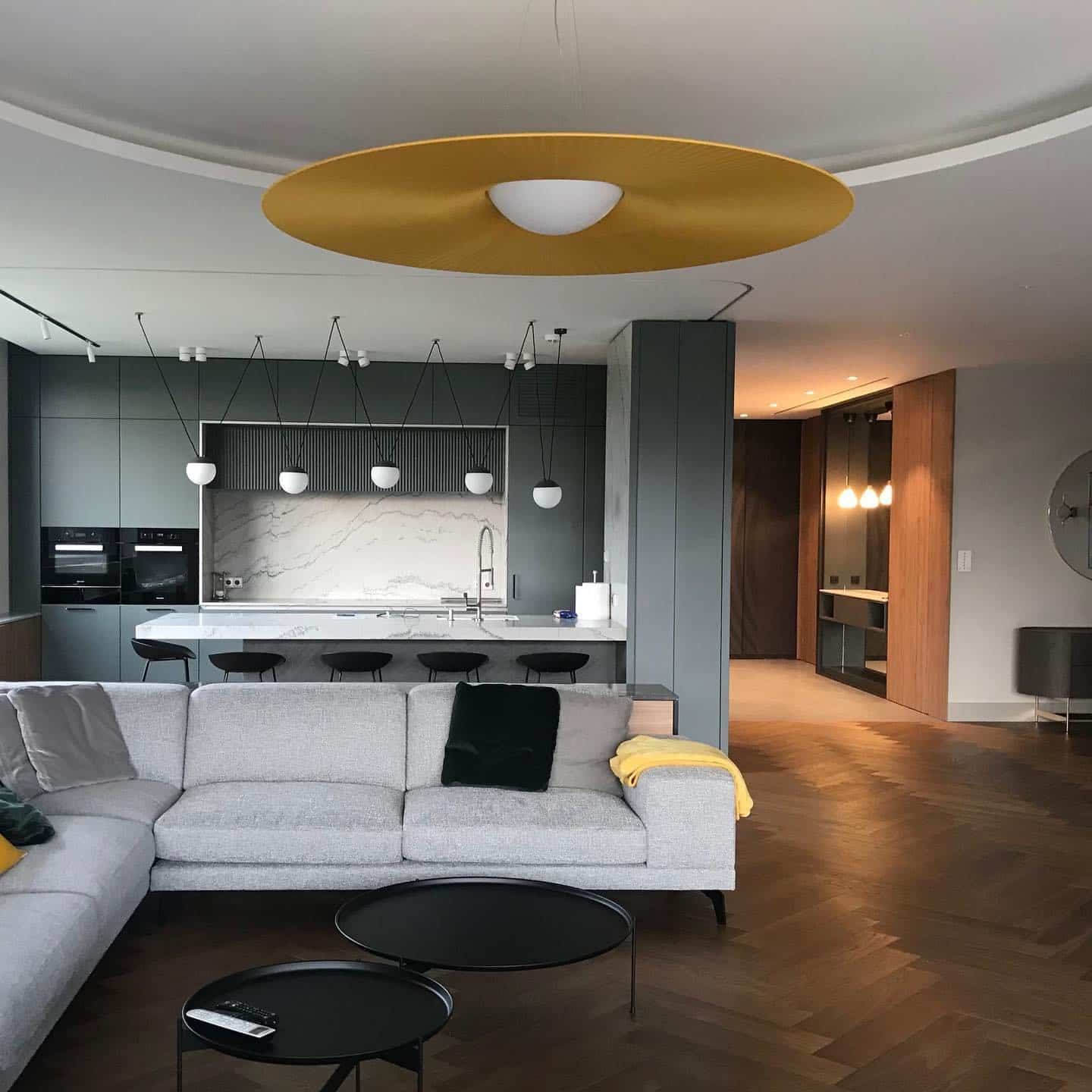 11. Modern Edge with Charcoal and Mustard Accents - kitchen and living room ideas