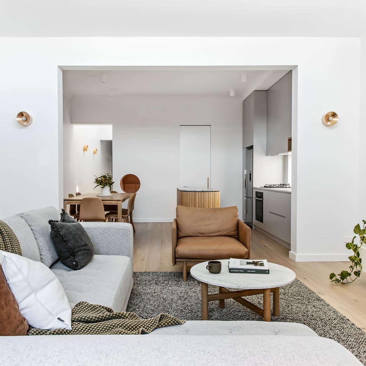 14. Scandinavian Simplicity with Soft Browns and Whites - kitchen and living room ideas