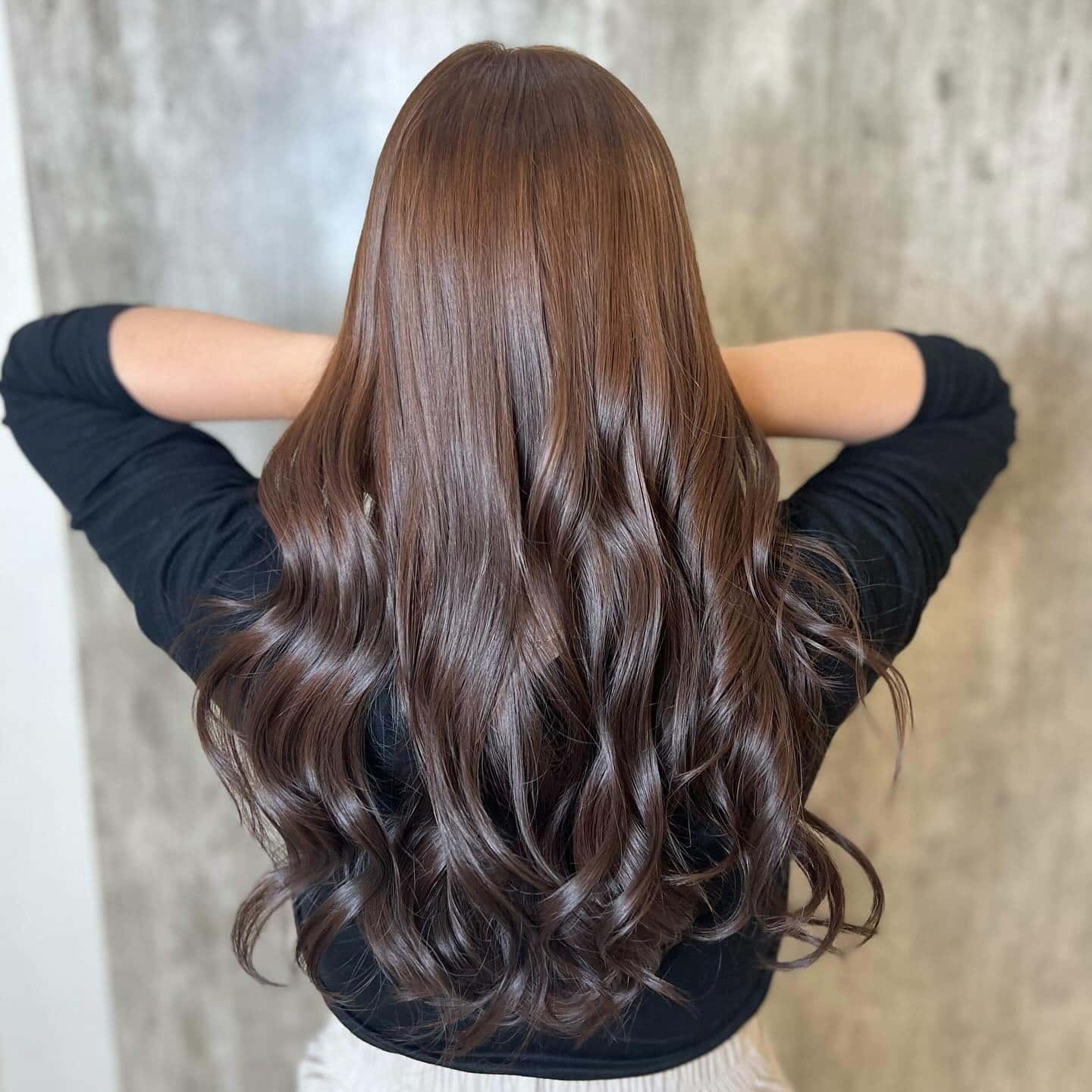 11. Silky Cocoa Waves - Soft Brown Hair Color