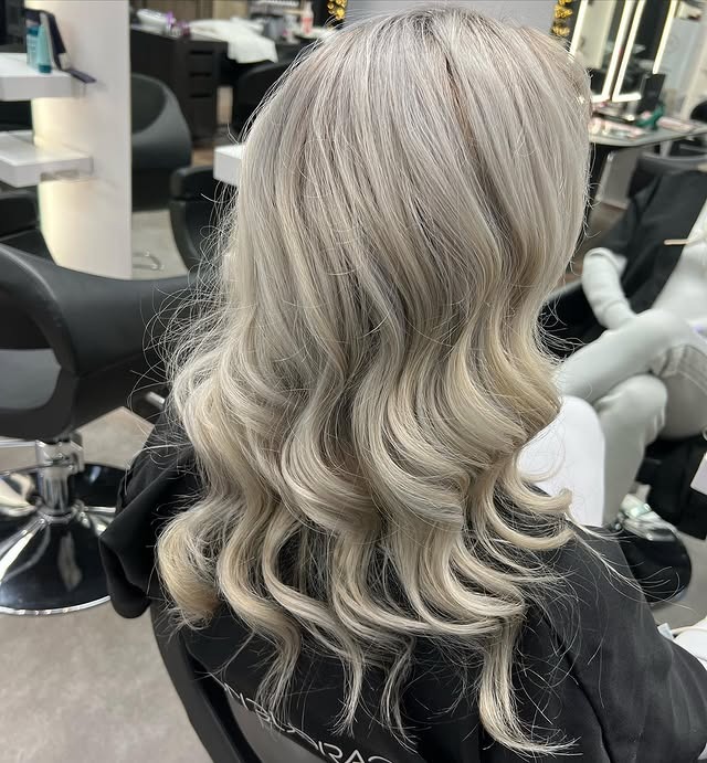 20. Platinum Ash Curls - Ash Hair Color