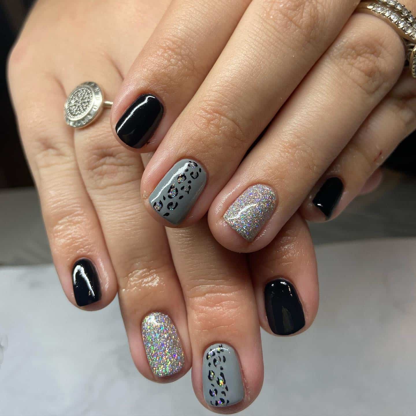 2. Short Black and Grey Mix with Sparkle - black and grey nail ideas