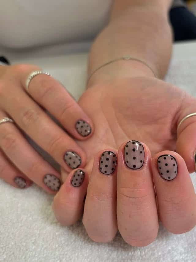 22. Sheer Grey with Black Polka Dots - black and grey nail ideas