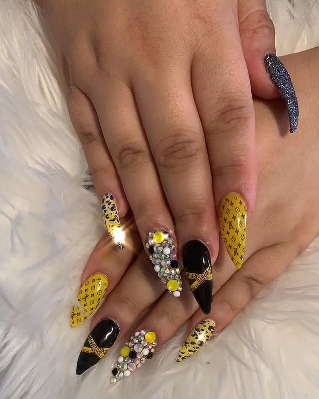 1. Luxe Yellow and Black Glam Nails - black and yellow nail ideas