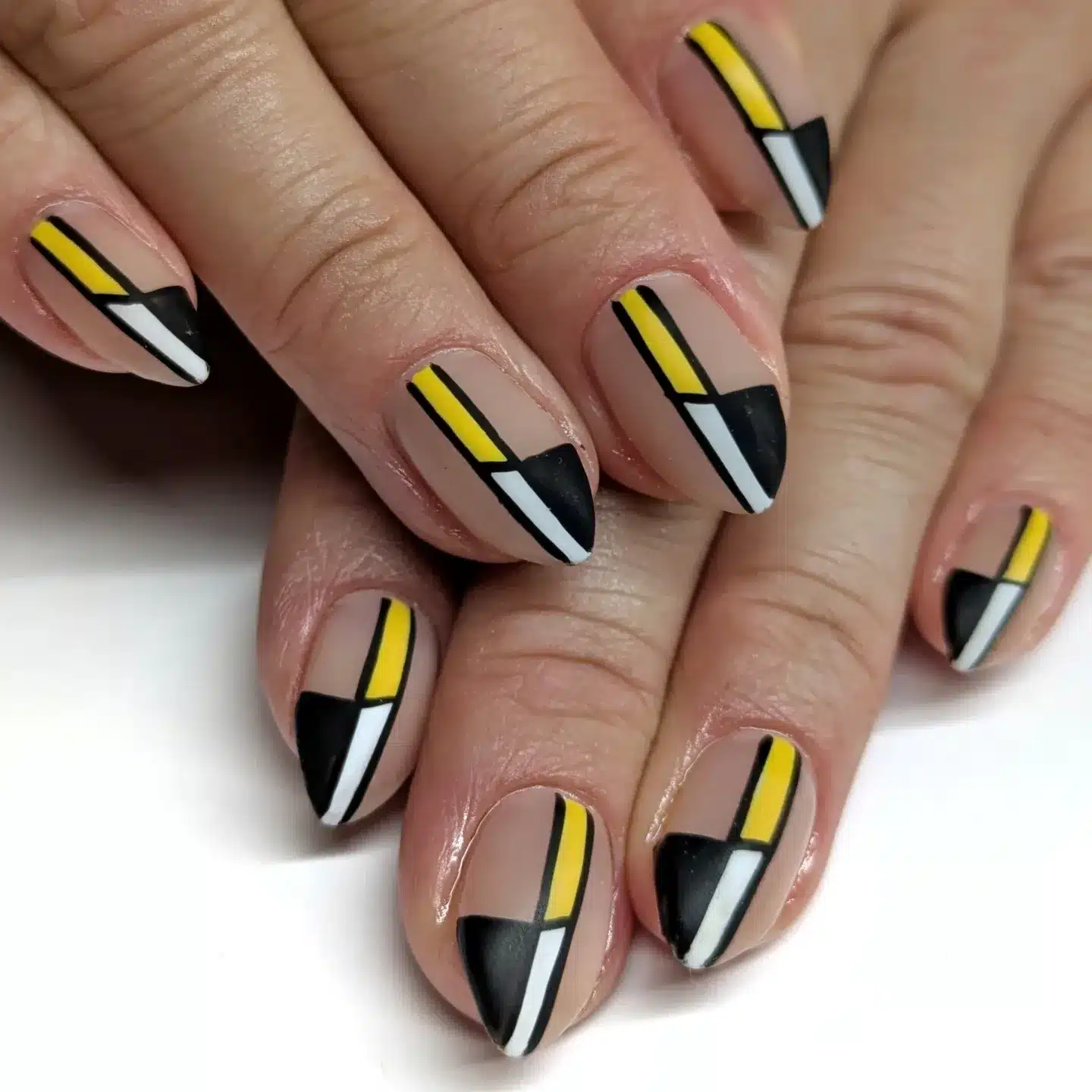6. Modern Abstract Nail Art - black and yellow nail ideas