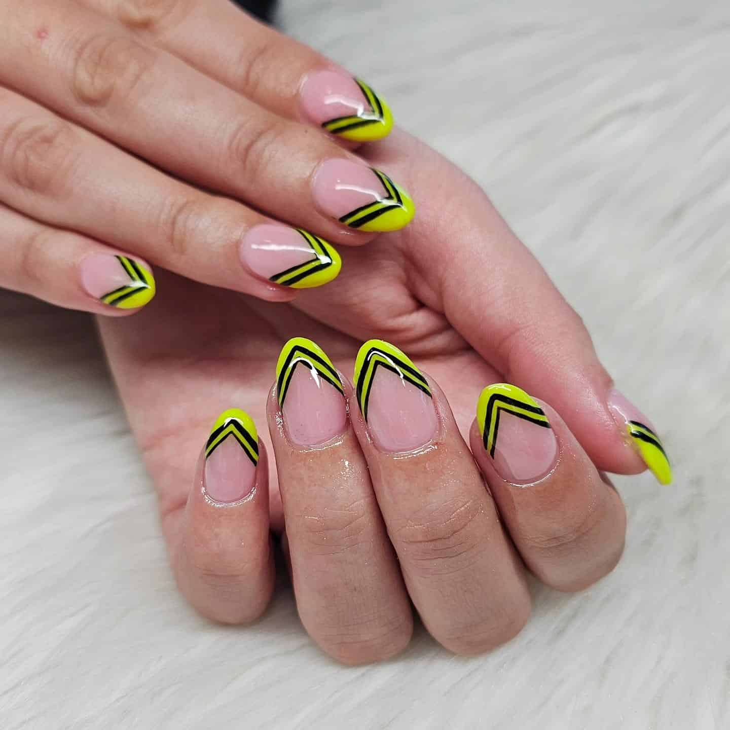 11. Neon Chevron French Tips - black and yellow nail ideas