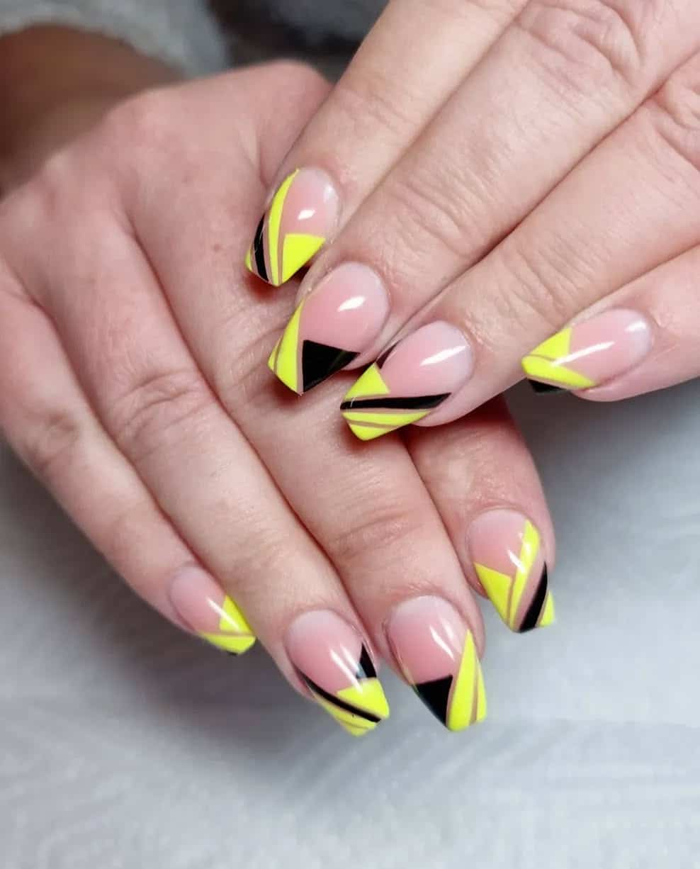 14. Angular Yellow and Black Nail Art - black and yellow nail ideas
