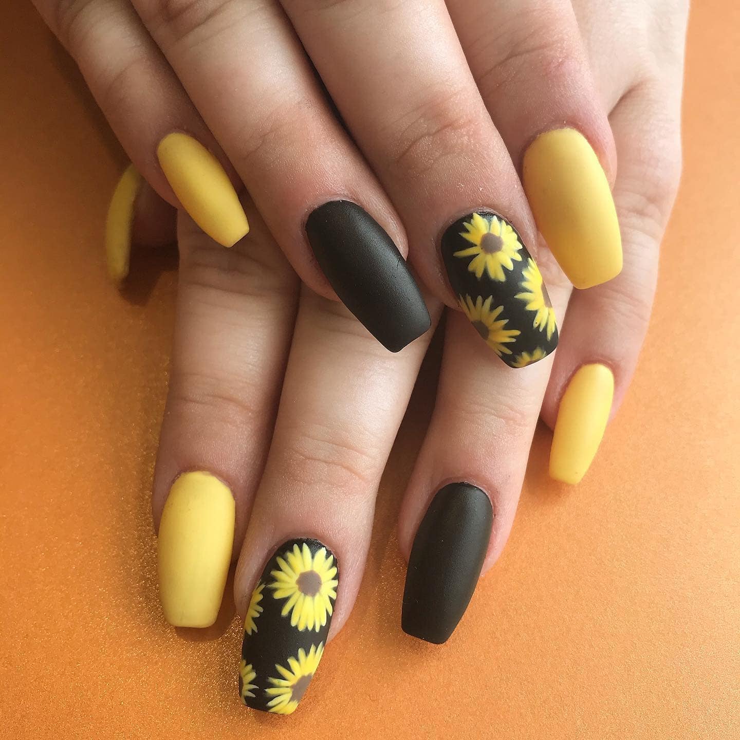 15. Matte Sunflower Nails - black and yellow nail ideas