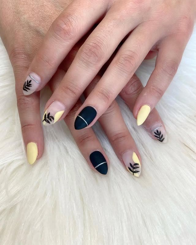 19. Minimalist Leaf Accent Nails - black and yellow nail ideas