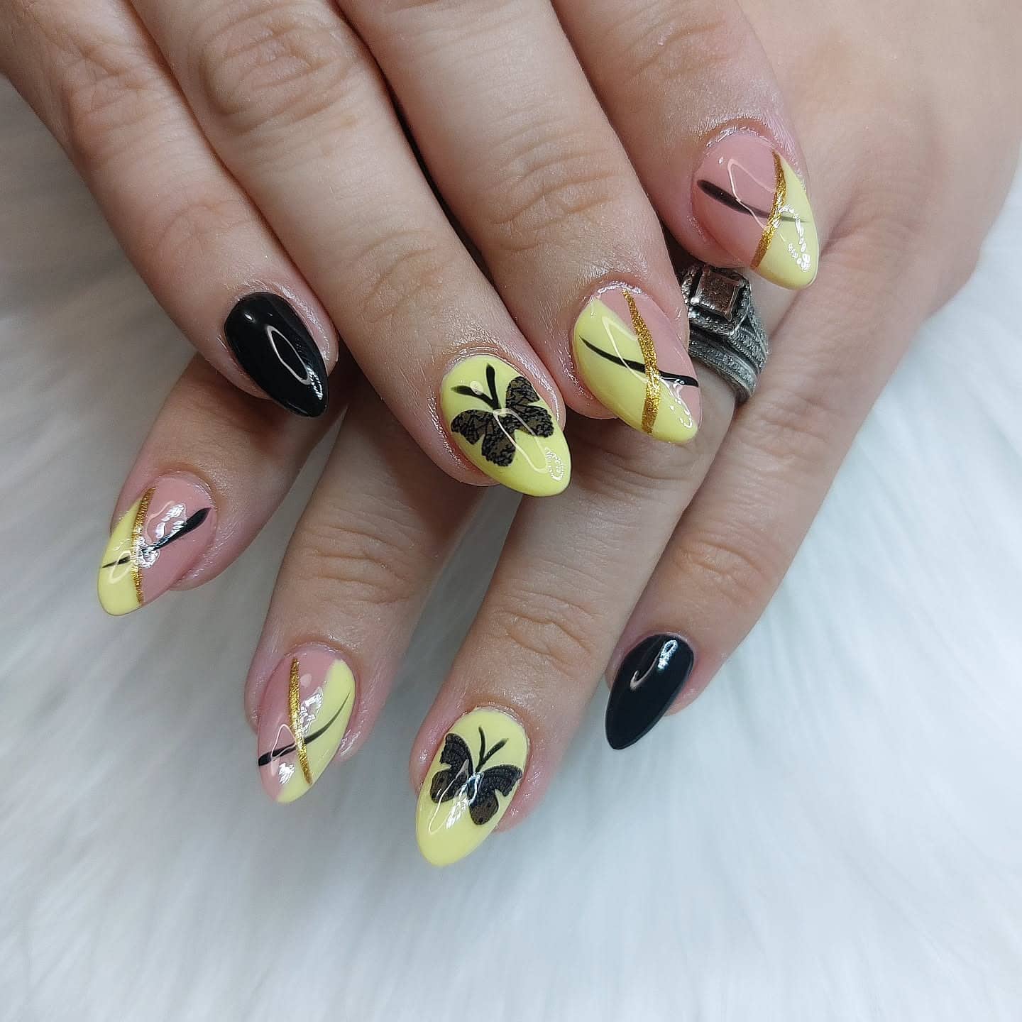 21. Butterfly Accent Black and Yellow Nails - black and yellow nail ideas