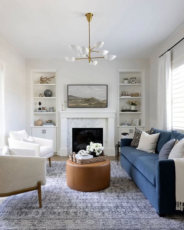 3. Contemporary Balance with Warm Accents - navy blue couch living room ideas