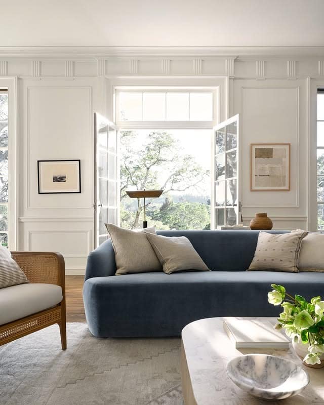 4. Effortless Light and Texture - navy blue couch living room ideas