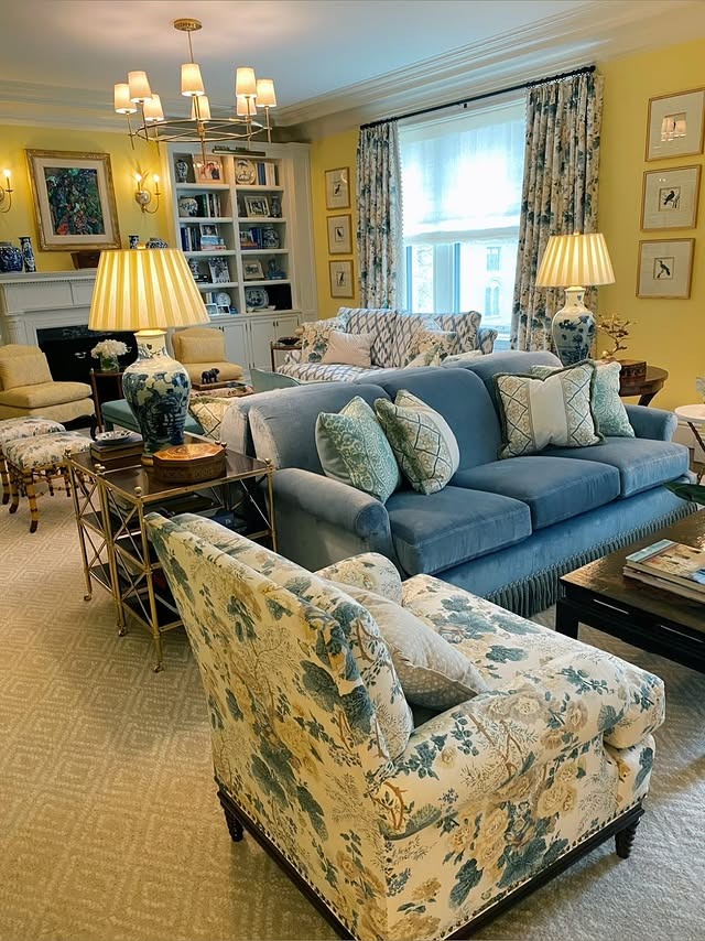 12. Cheerful Elegance with Patterned Layers - navy blue couch living room ideas