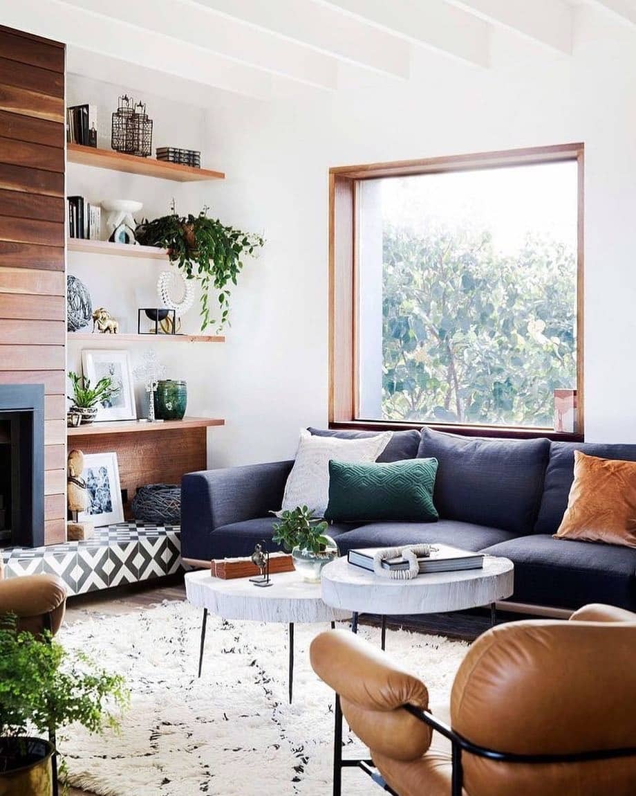 22. Modern Warmth with Natural Accents - navy blue couch living room ideas