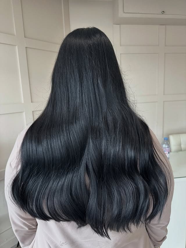 13. Sleek and Flowing Soft Black Length - Soft Black Hair Color