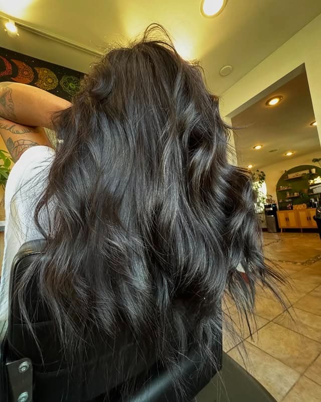 21. Loose Voluminous Waves in Soft Black - Soft Black Hair Color