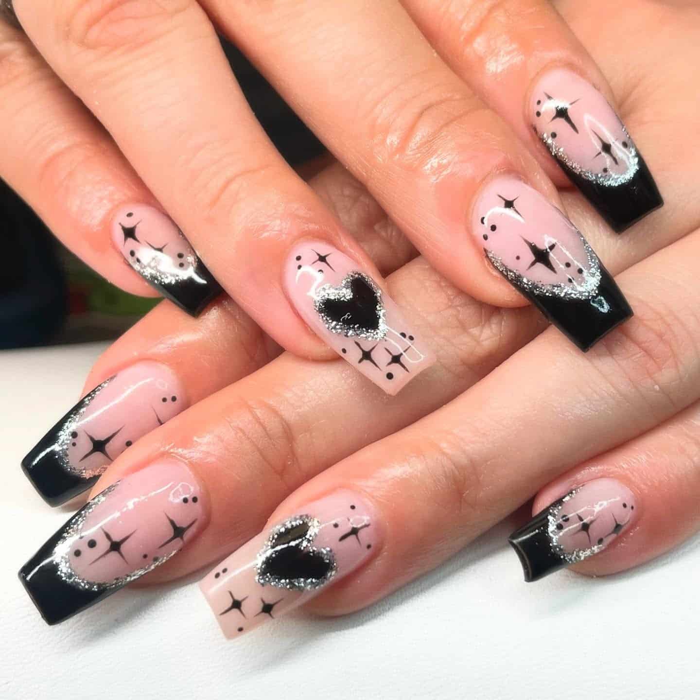 7. Sparkling Black Heart Elegance - black valentine nail ideas