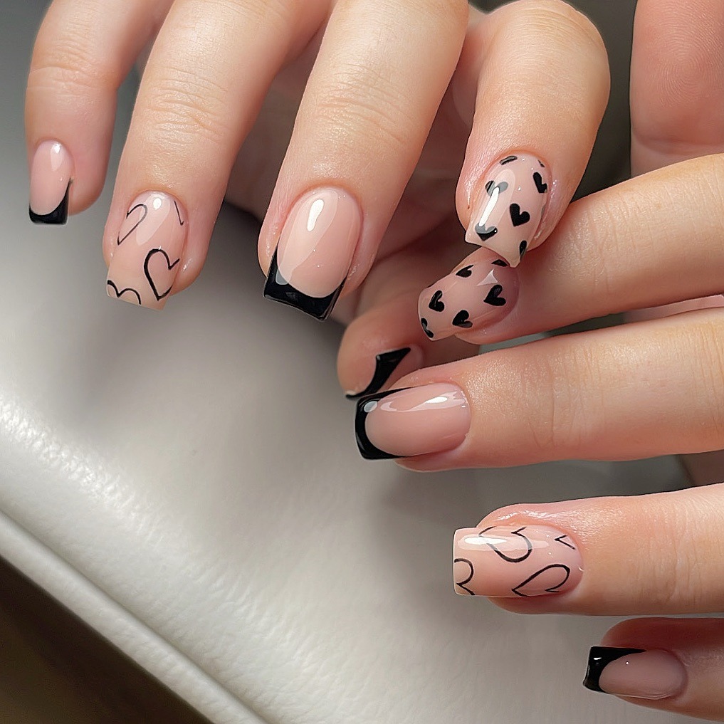 10. Chic Heart French Mix - black valentine nail ideas