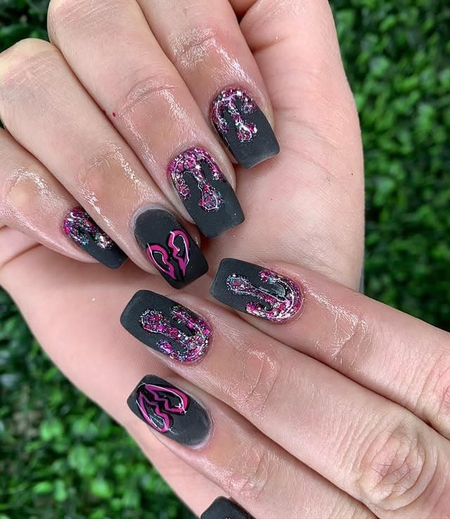 15. Broken Heart with Glitter Flames - black valentine nail ideas