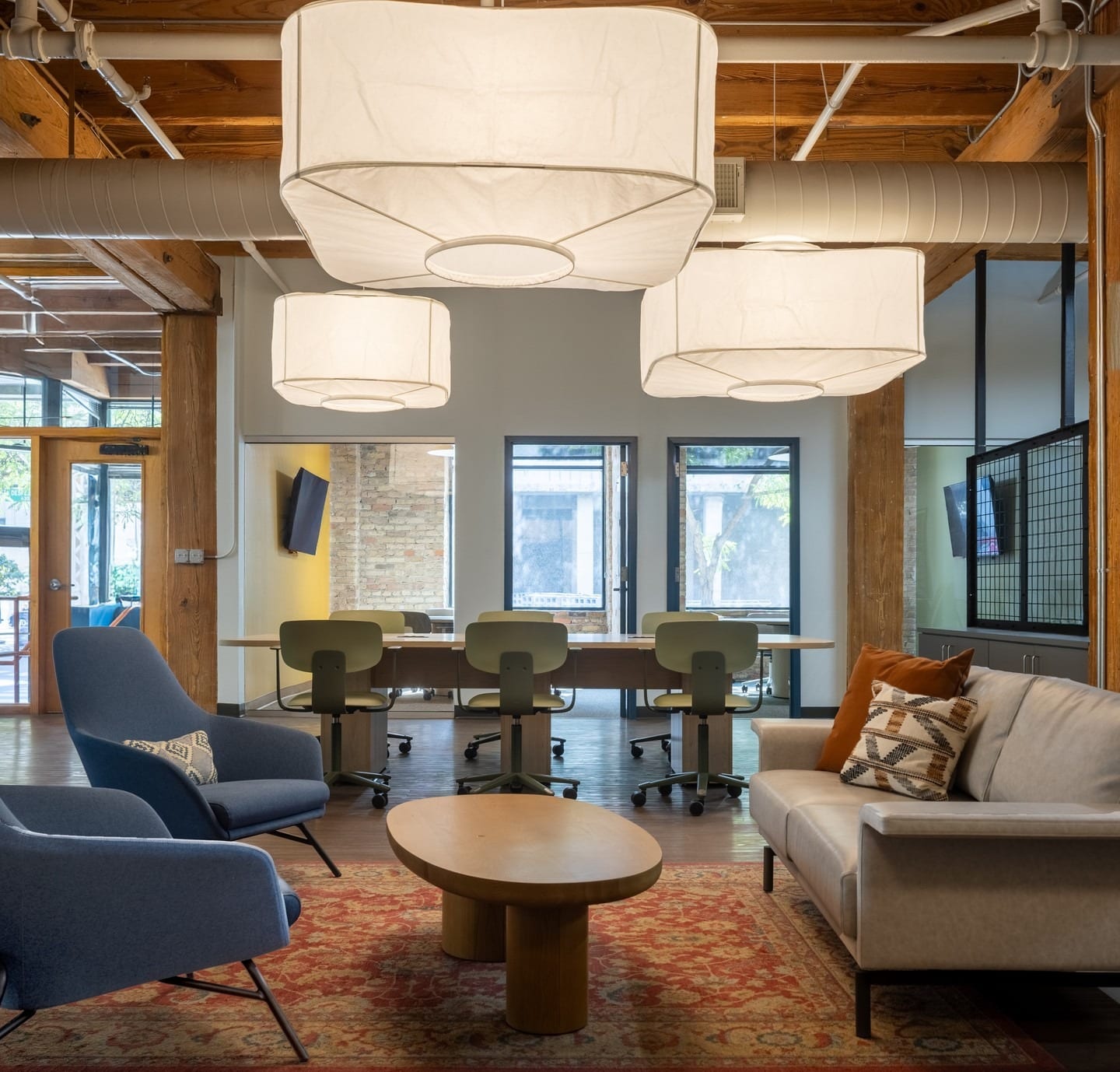 4. Warm Rustic with Modern Comfort - cool office ideas