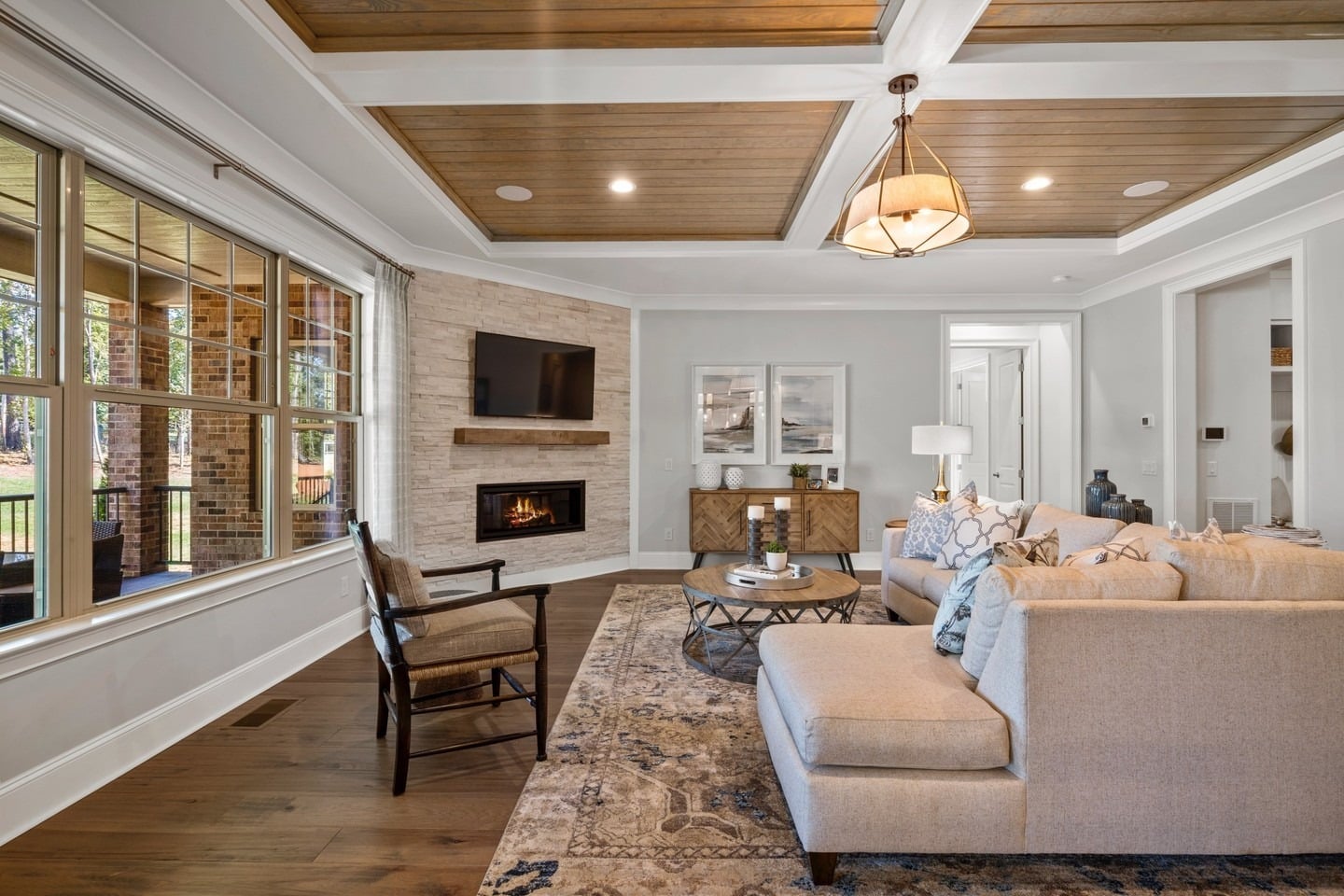 1. Warm Transitional Living with Wood Accents - open living room ideas