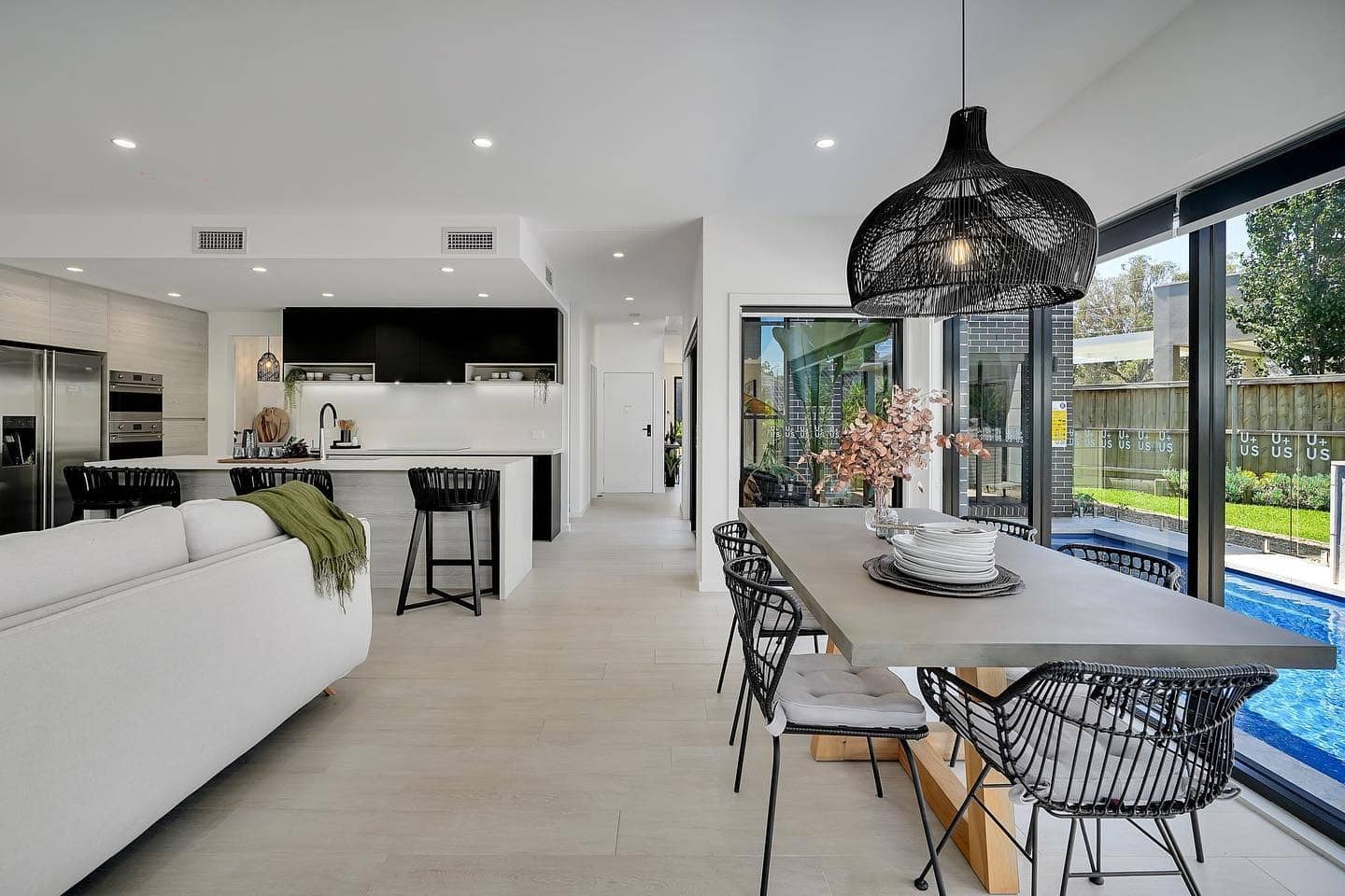 22. Contemporary Open Living with Black Accents - open living room ideas