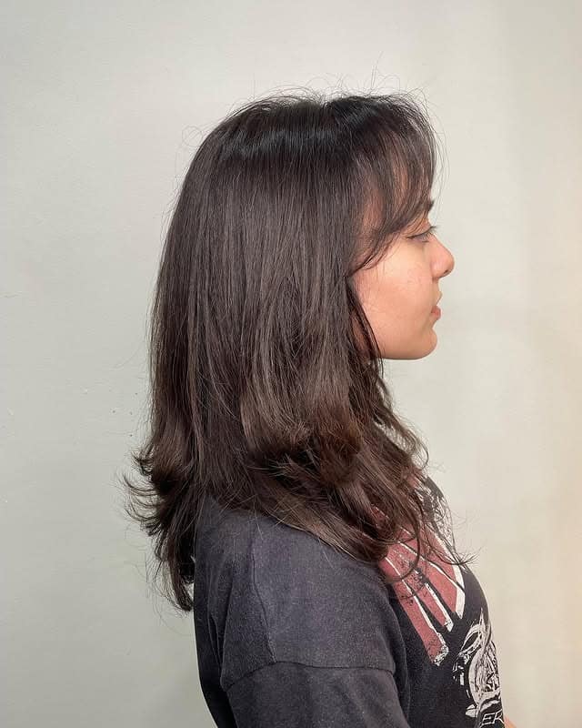 2. Textured Medium Layers with Natural Dark Finish - Layered Hairstyles