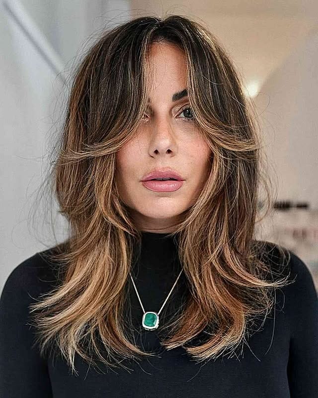 7. Dimensional Layers with Caramel Highlights - Layered Hairstyles