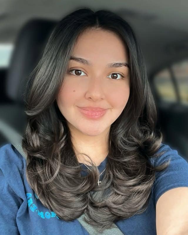 10. Glossy Black Layers with Soft Ends - Layered Hairstyles